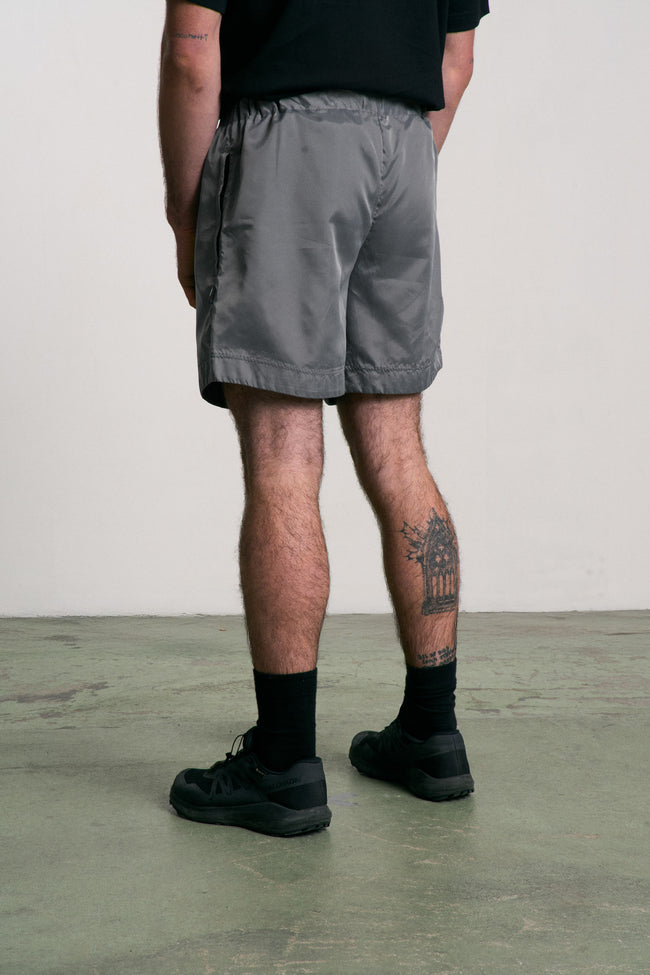 Shot de sport unisexe fabriqué à partir de toiles de tente. Coloris limités. Fabrication soignée.